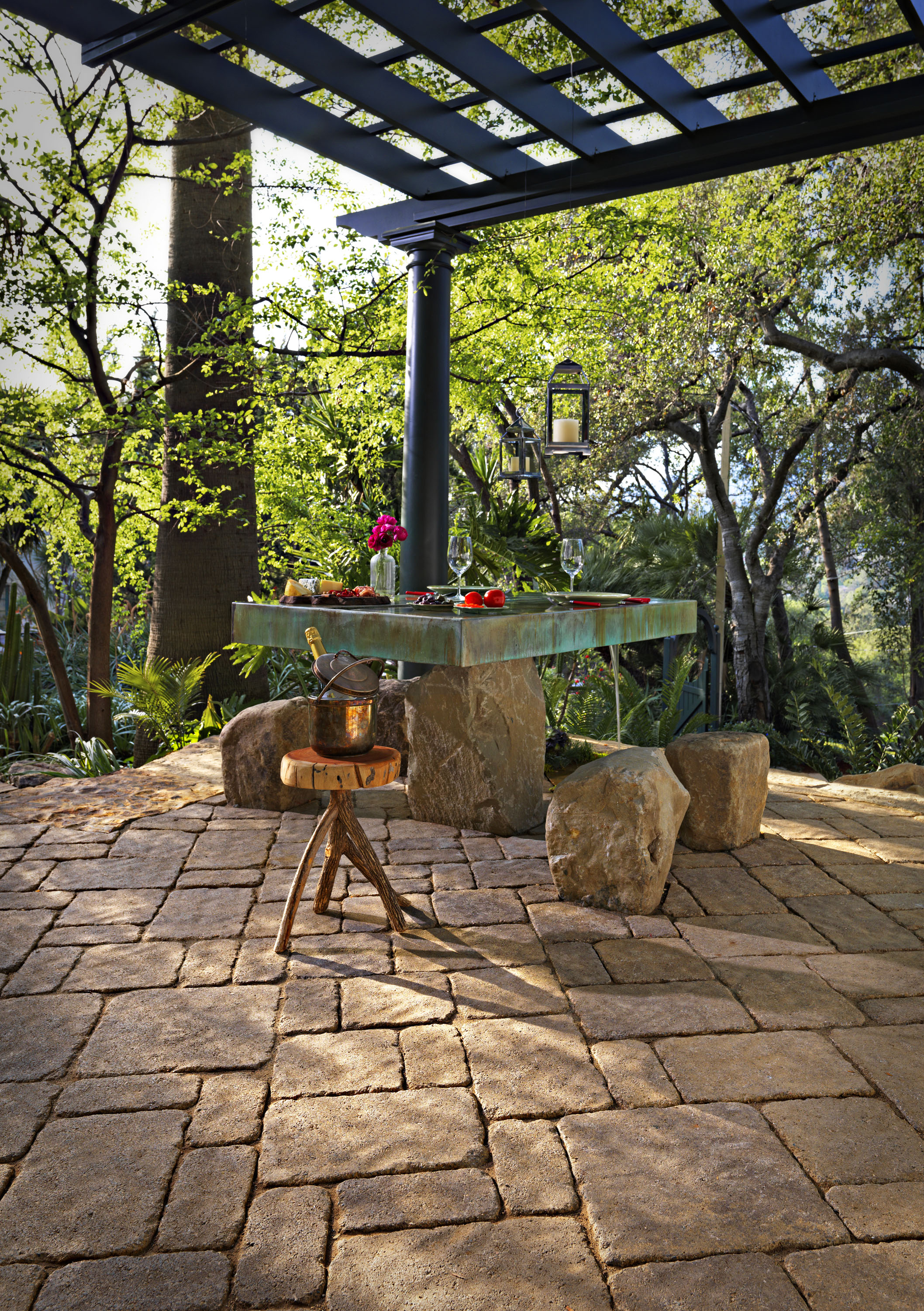 Completed Pasadena backyard remodel with a shaded pergola dining area and paver patio