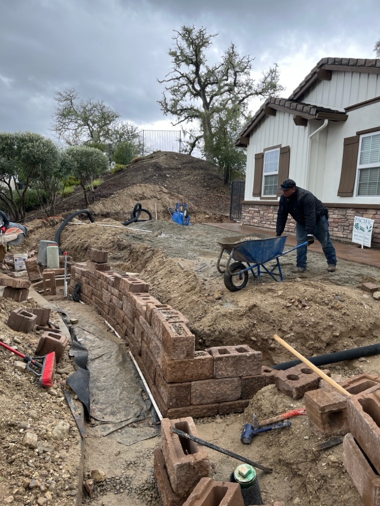 Pool construction in progress showing active construction work and site conditions