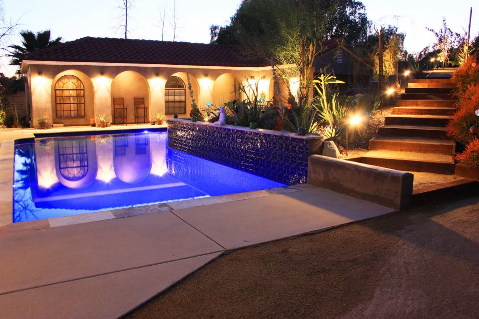 pool with outdoor lighting