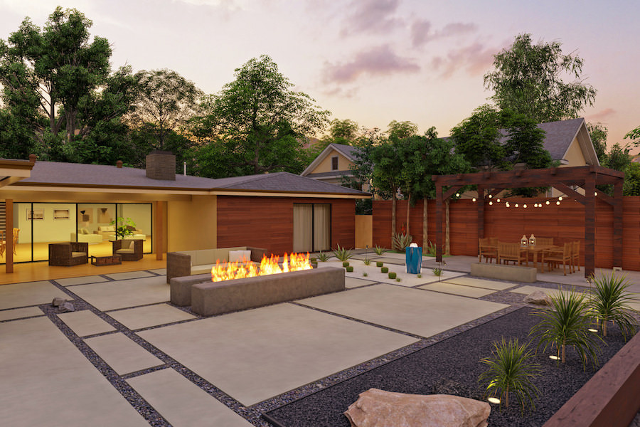A real YardMap fire feature design with a built-in sofa and dining pergola at dusk
