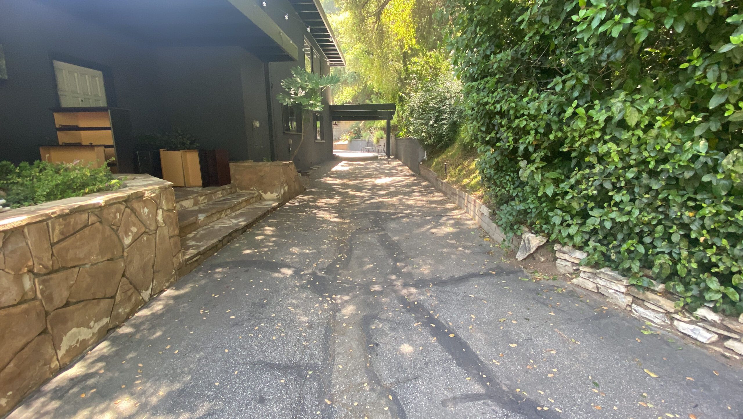 Driveway before renovation prior to design and construction by Pacific Outdoor Living