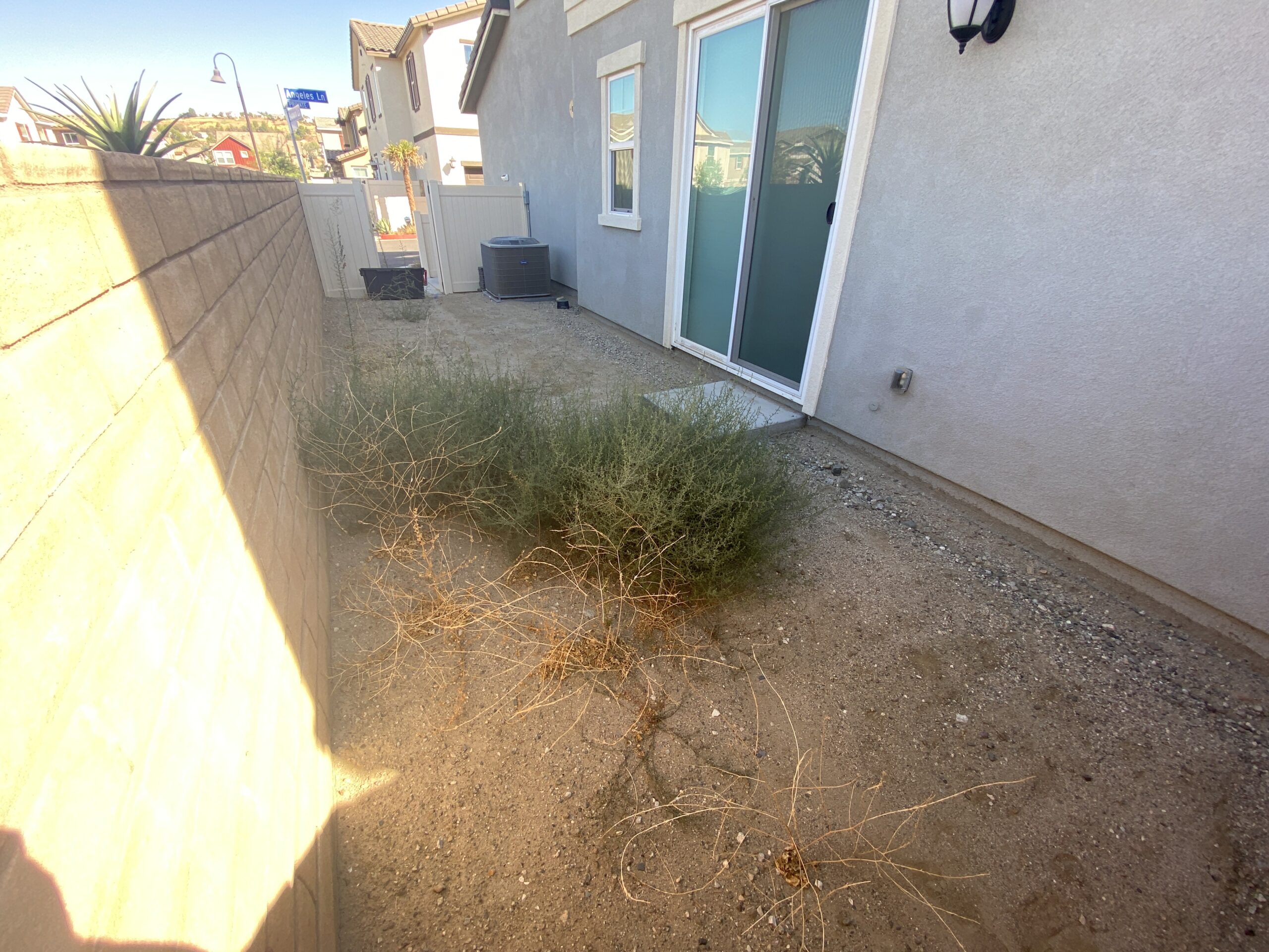 Side yard before renovation prior to design and construction by Pacific Outdoor Living