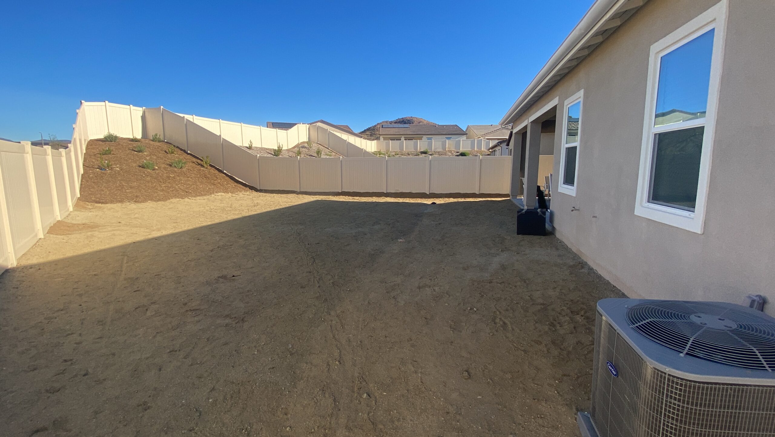 Backyard before renovation prior to design and construction by Pacific Outdoor Living