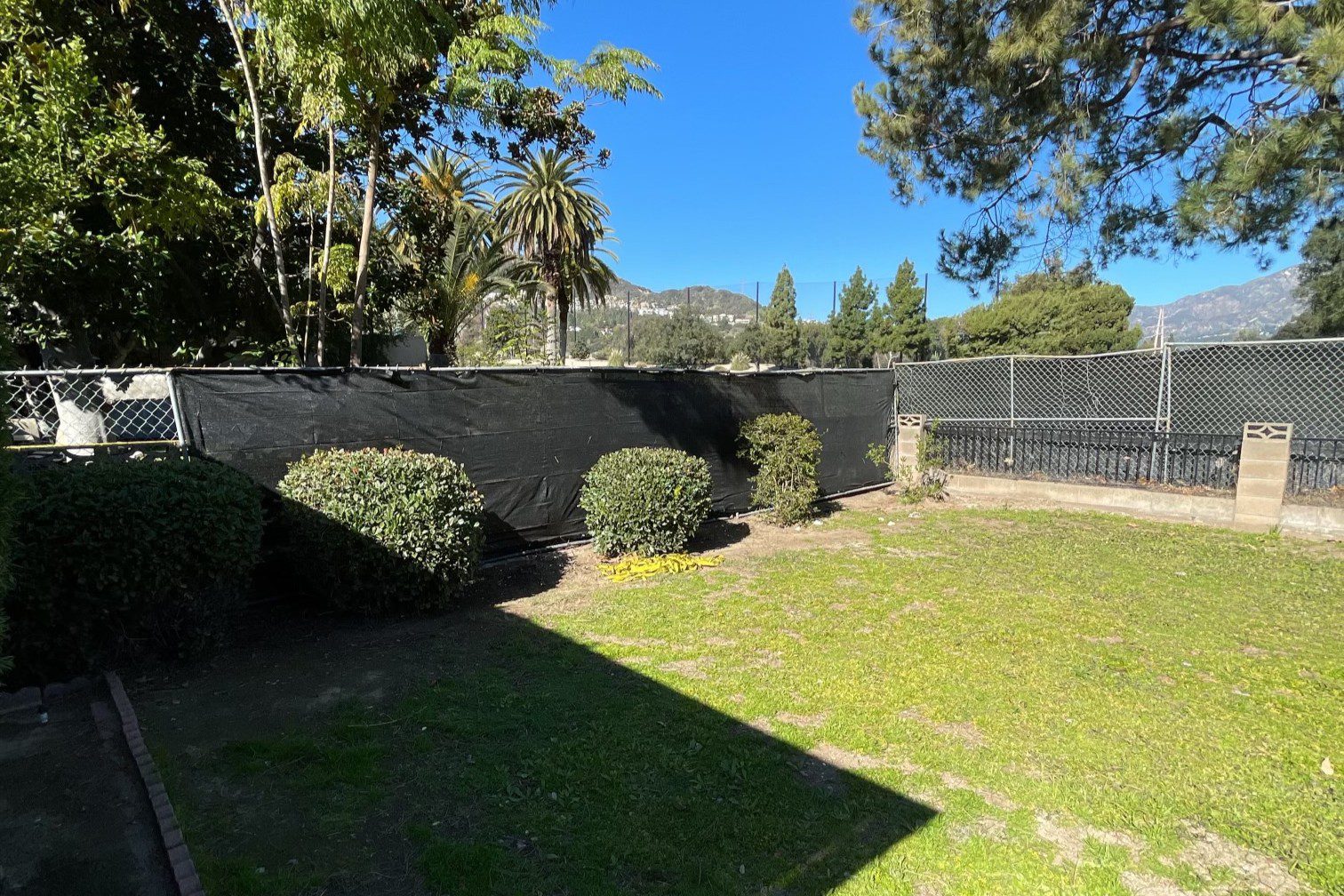 Backyard before renovation prior to design and construction by Pacific Outdoor Living