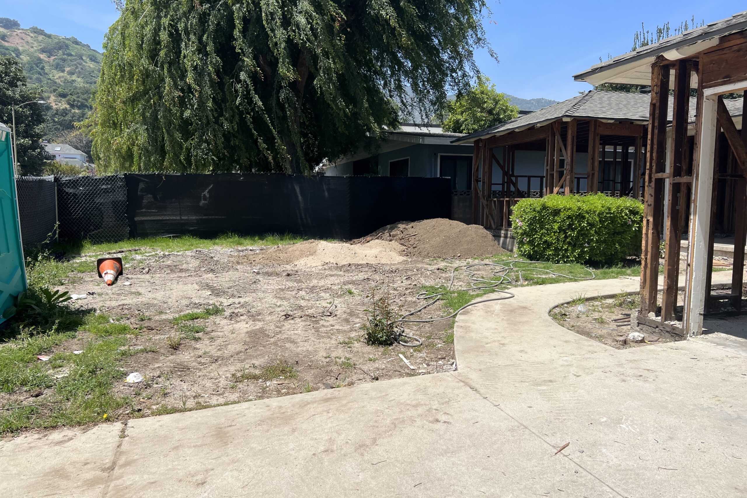 Backyard before renovation prior to design and construction by Pacific Outdoor Living