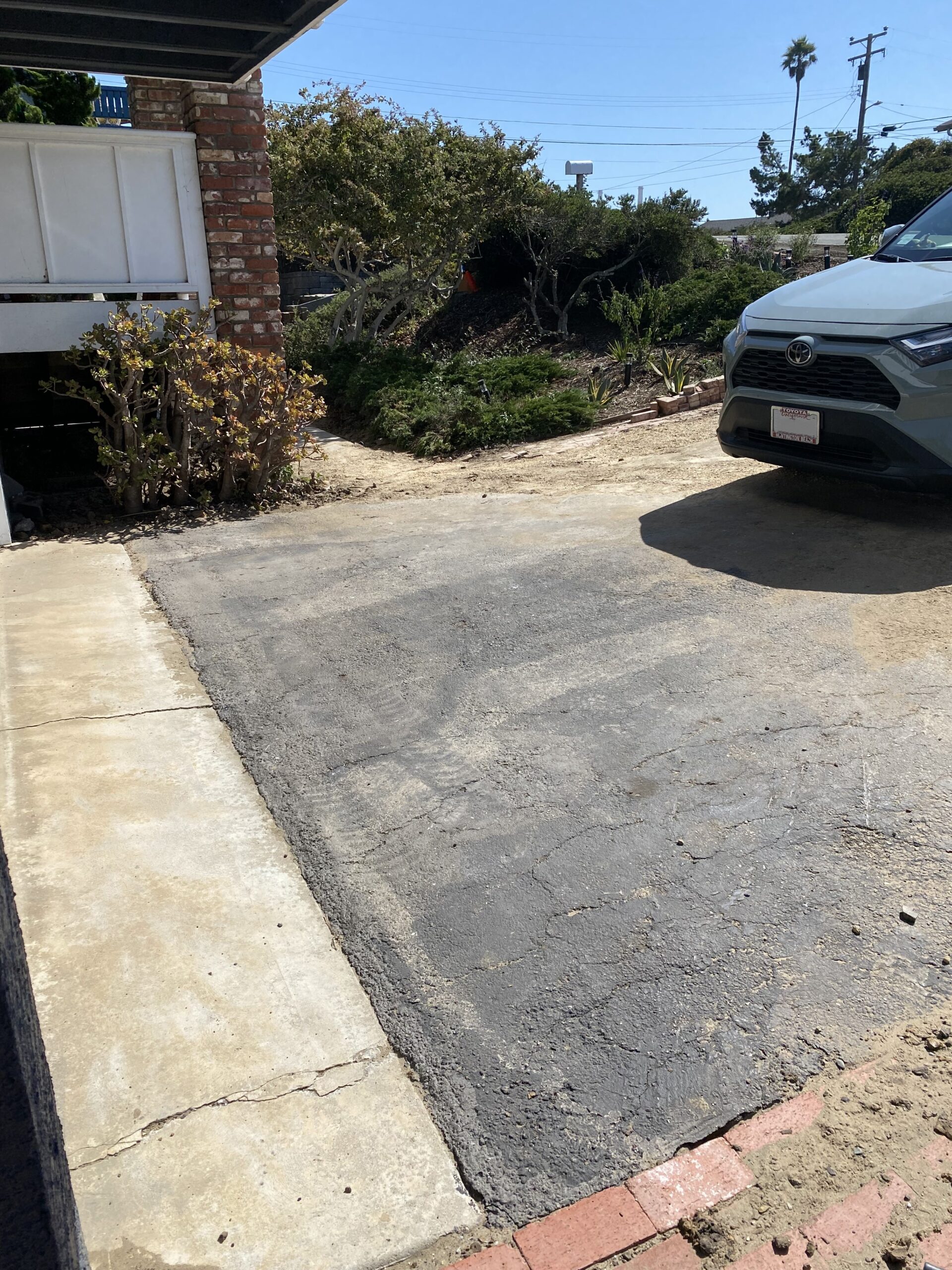 Driveway before renovation prior to design and construction by Pacific Outdoor Living