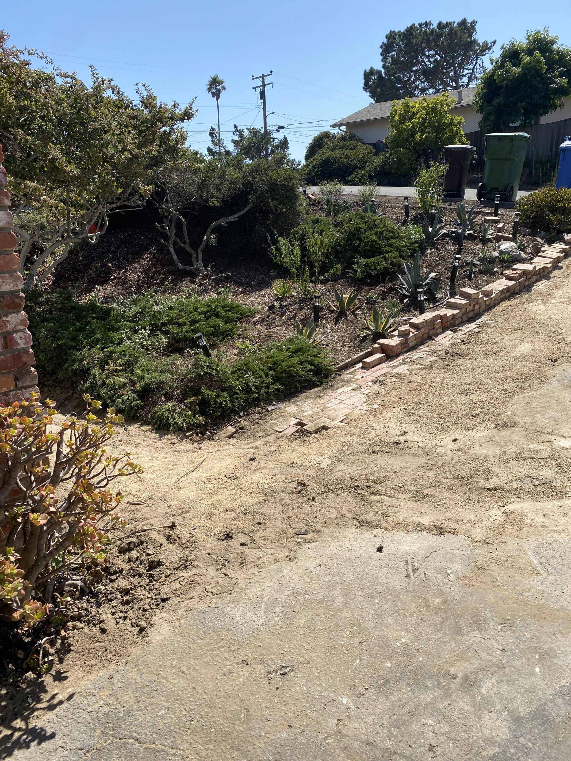 Driveway before renovation prior to design and construction by Pacific Outdoor Living