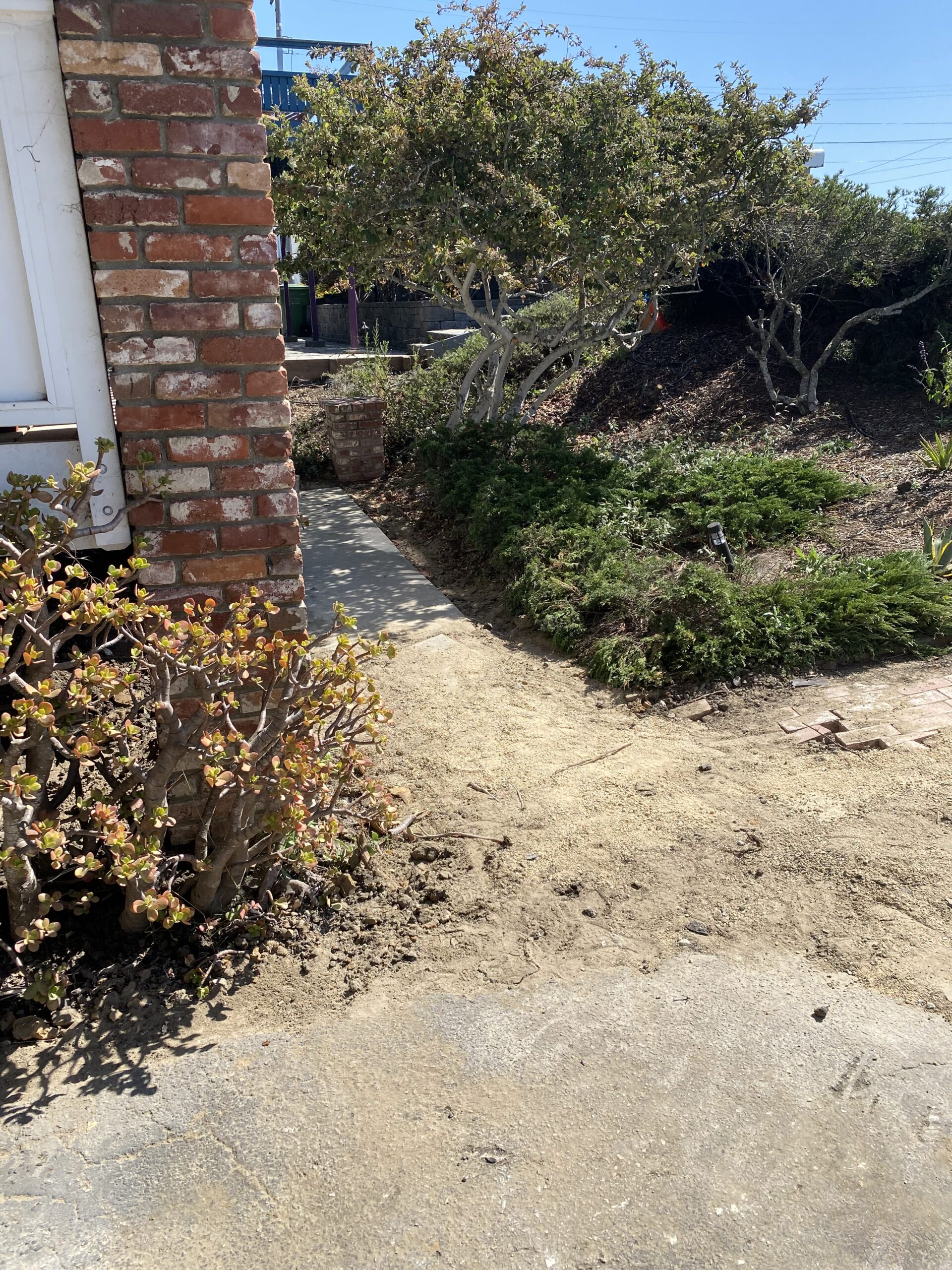 Driveway before renovation prior to design and construction by Pacific Outdoor Living