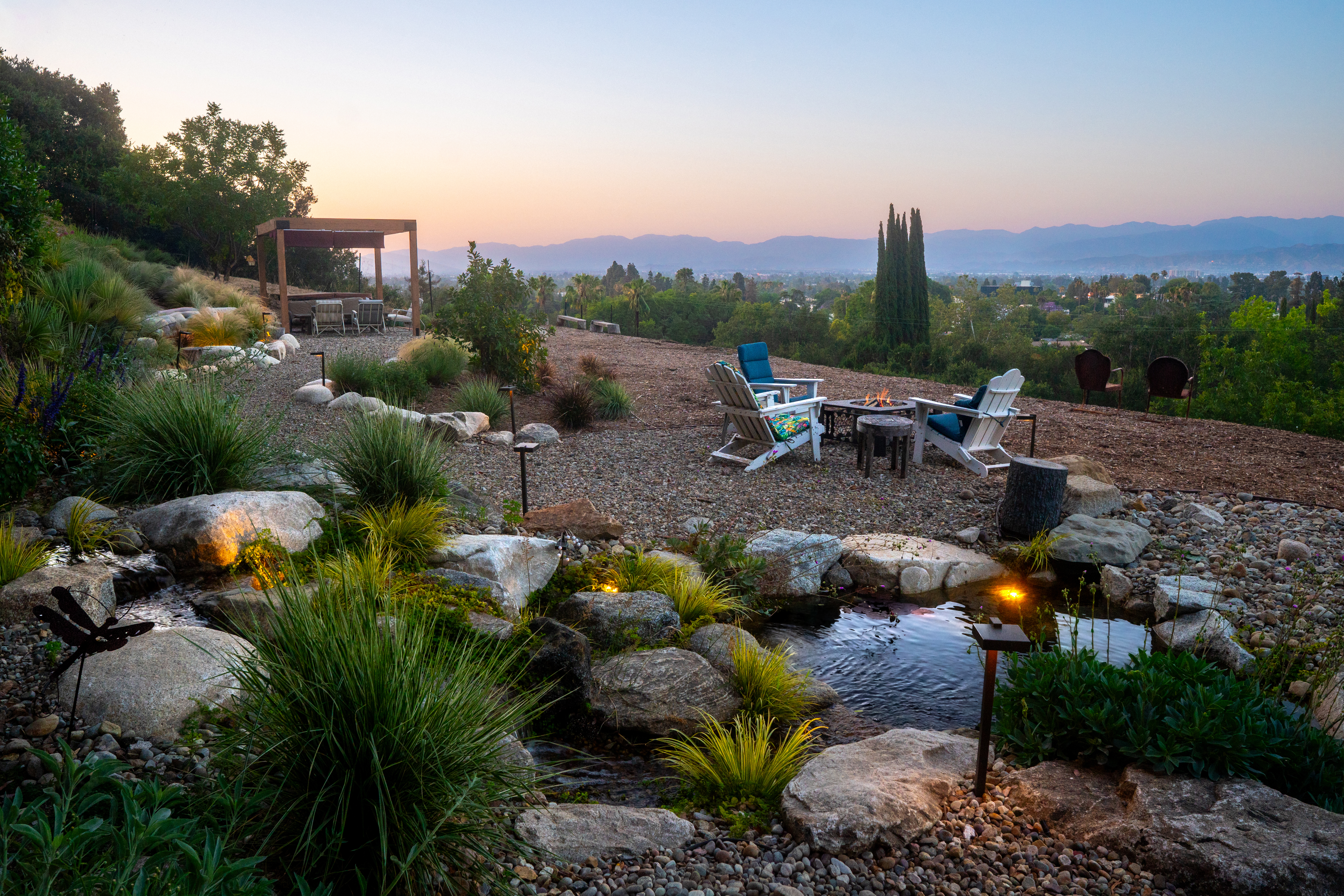Hillside fire pit seating area at sunset overlooking the Conejo Valley