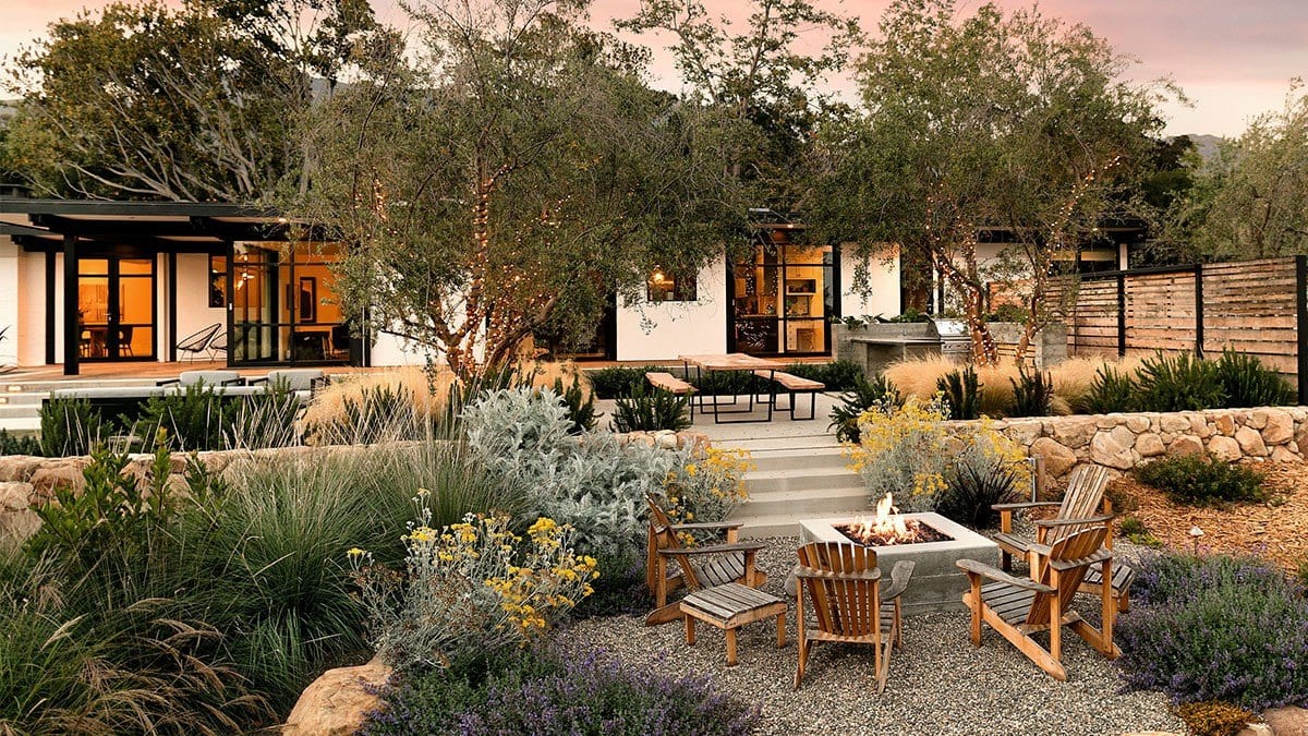 Water-wise succulents and native plantings with decorative grasses and water features