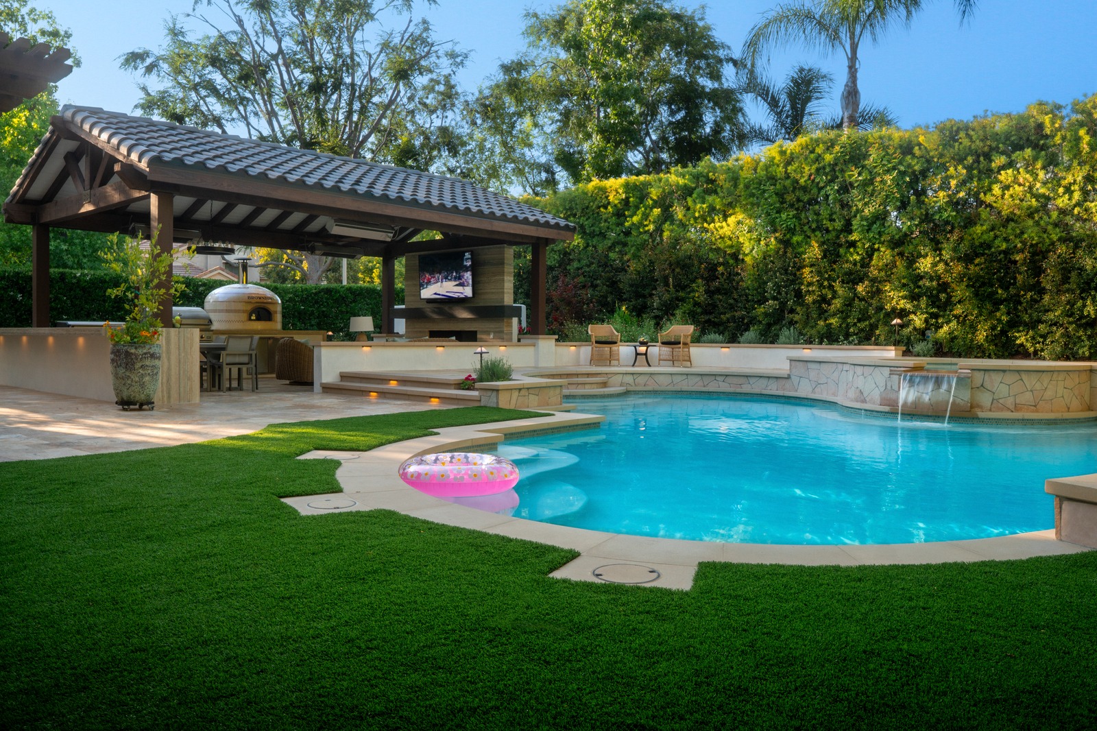 Remodeled pool and spa with updated coping and plaster finish