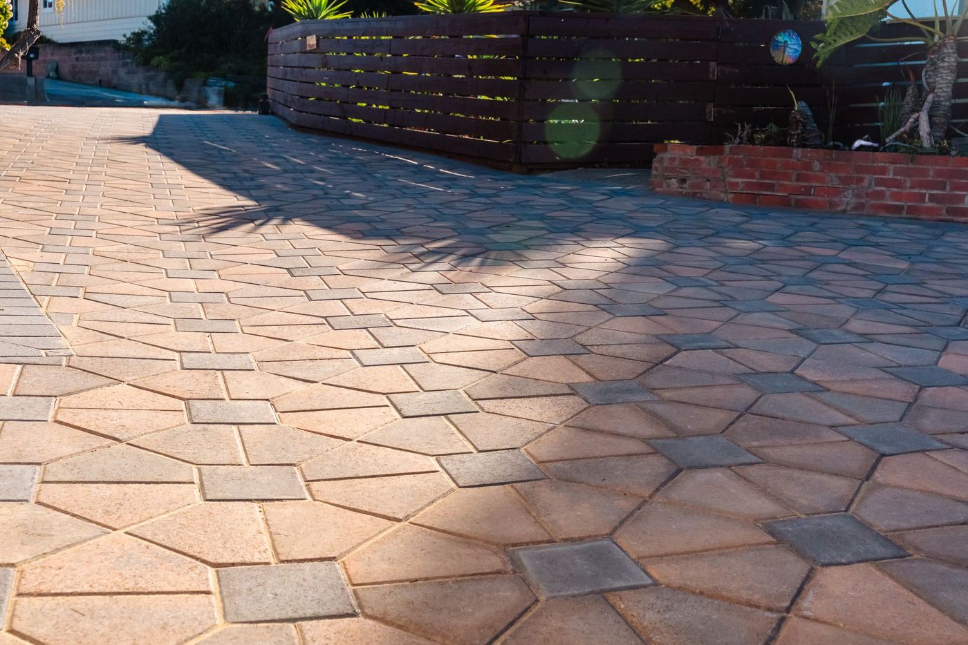 Close-up of interlocking concrete paver pattern used in a custom driveway installation in Morro Bay, California.