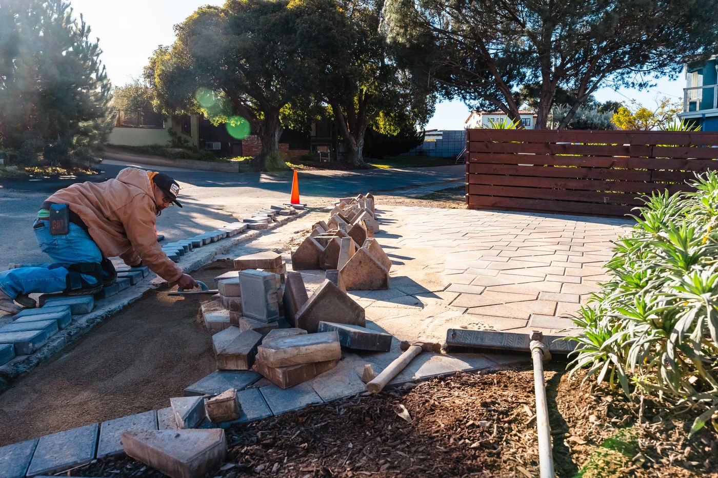 Paver installation with clean joint lines and compacted base preparation