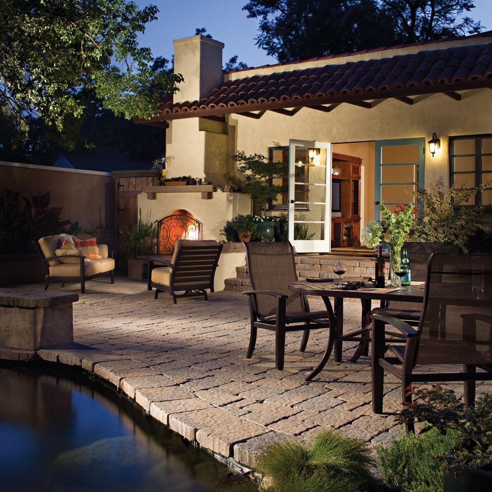 Outdoor living patio with fireplace and comfortable entertaining space