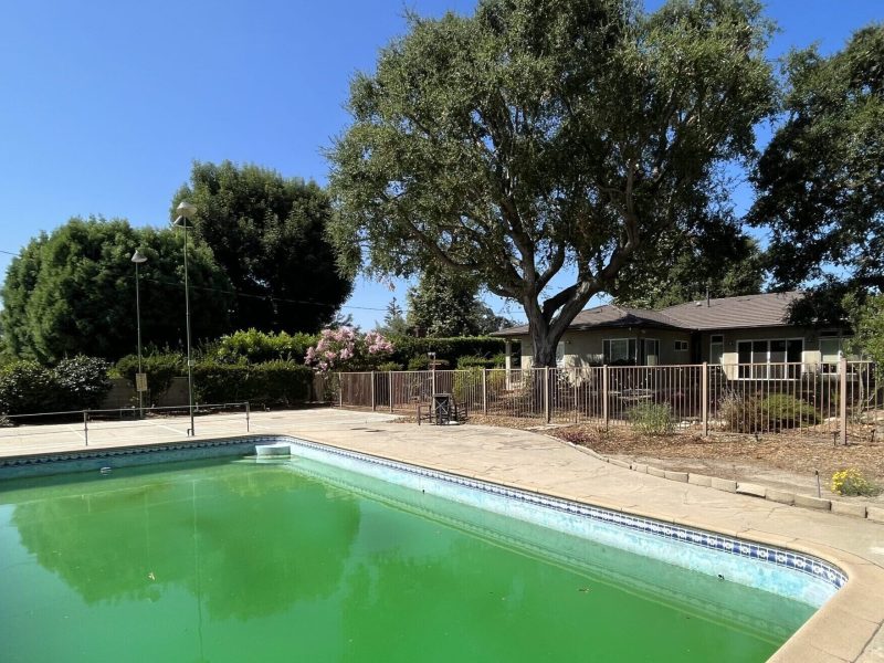 Backyard before renovation prior to design and construction by Pacific Outdoor Living